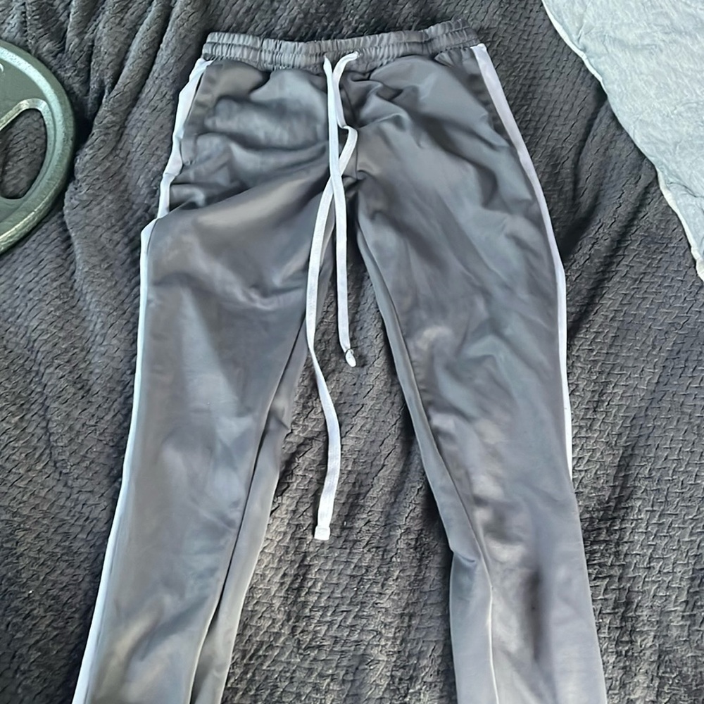 Grey track pants